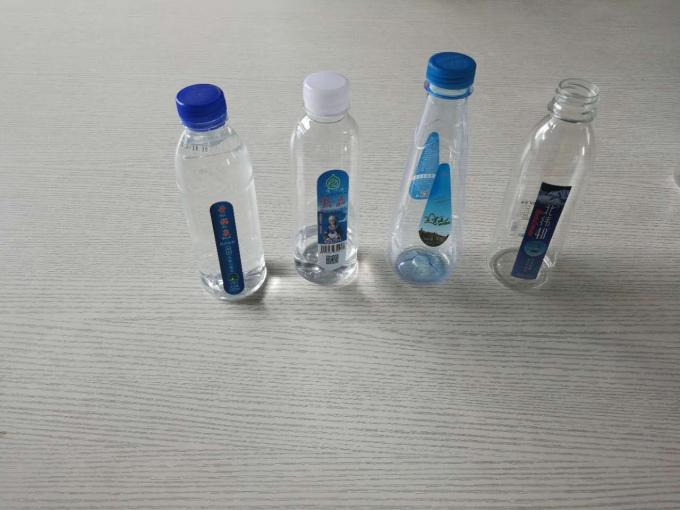 Etiketa itsasgarriak Ur botilak etiketatzeko ekipoetarako plastikozko botilak etiketatzeko makina