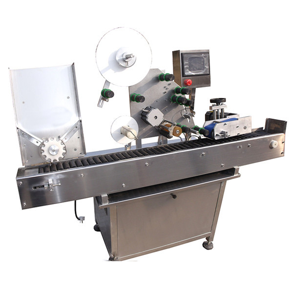 Botila biribil txikiaren eranskailua etiketatzeko makina birakariarekin